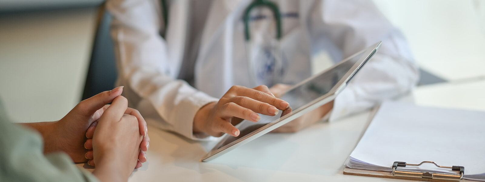 clinical trial doctor with tablet