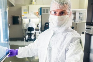 Biomarker molecular and genomics technician working in a lab